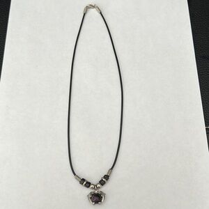 Elegant Black and Silver Necklace with Purple Pendant